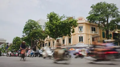 cars near road and houses