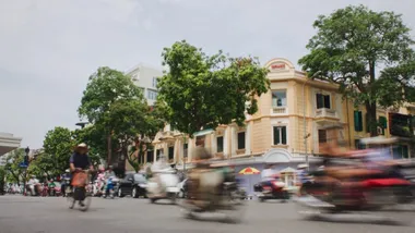 cars near road and houses